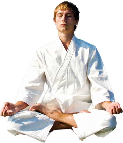 Martial Arts Lessons for Adults in Lewisville TX - Young Man Thinking and Meditating in White